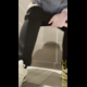 Miss Marilyn sits on a toilet with her pants up. No pooping shown. Presented in 720P vertical HD format. About half a minute.